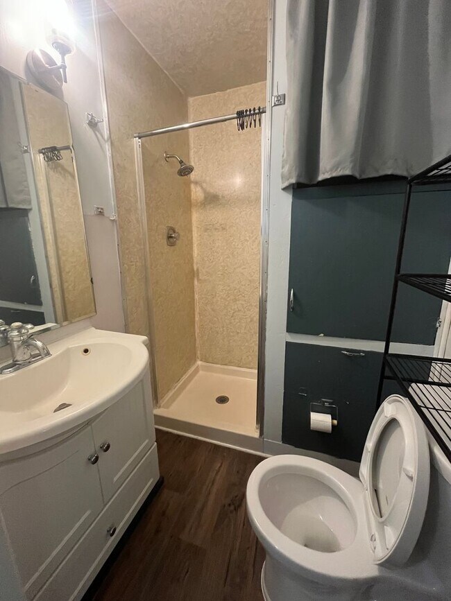 Building Photo - Fully Furnished 1-Bedroom Duplex.