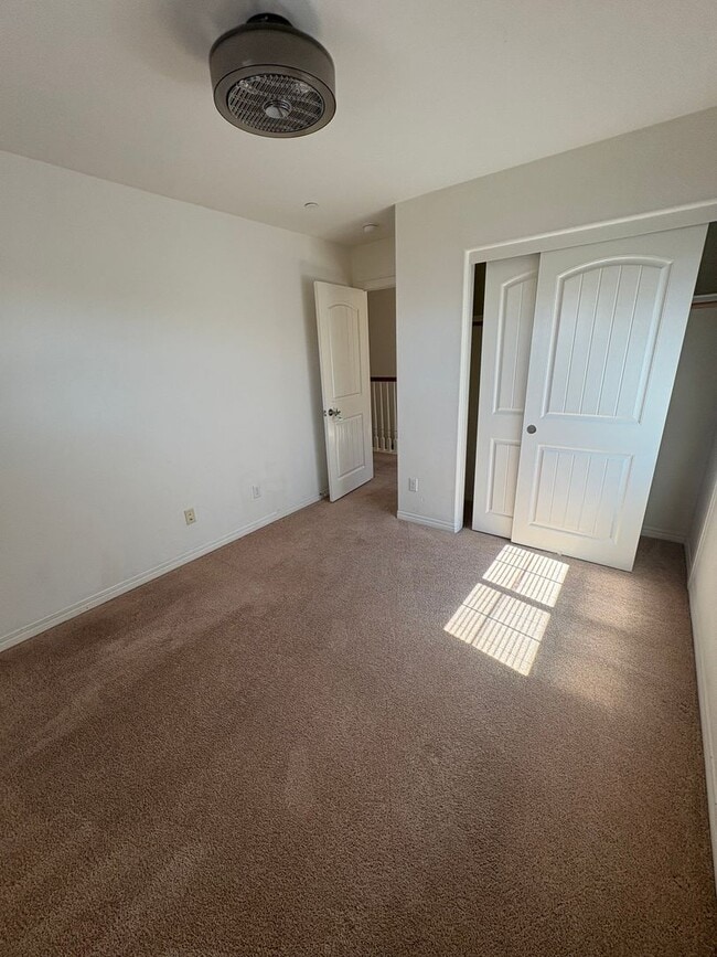 Building Photo - Spacious 4-Bedroom Home with Large Backyard.