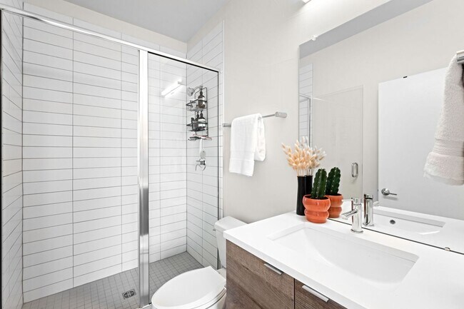 Building Photo - Modern 2-Bedroom Rowhome with Rooftop Moun...