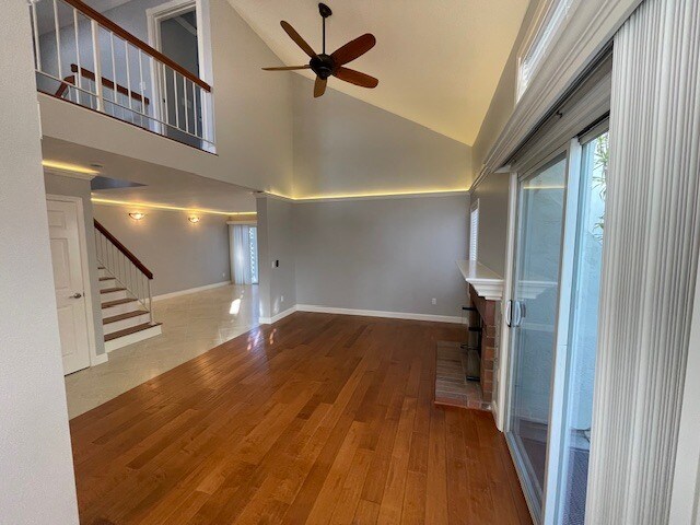 Living room vaulted ceiling with ceiling fan - 10545 Kemerton Rd