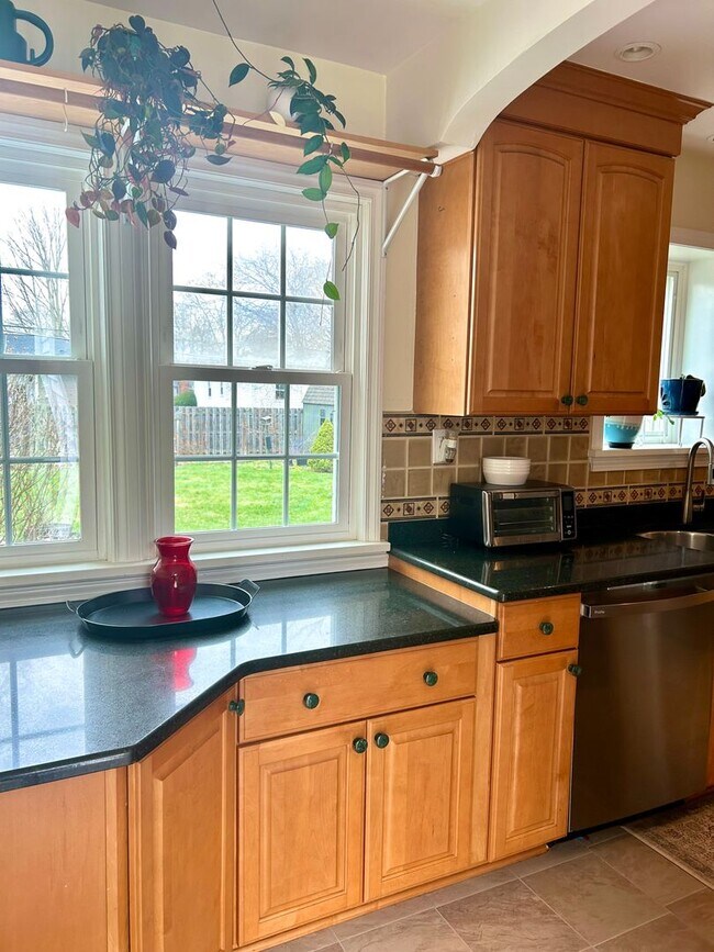 Building Photo - Sunroom Retreat | Fully Furnished 3BR with Private Fenced Yard