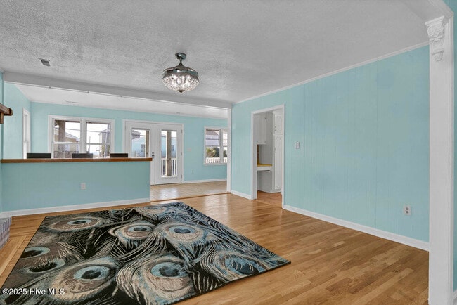 Building Photo - 1207 N Topsail Dr