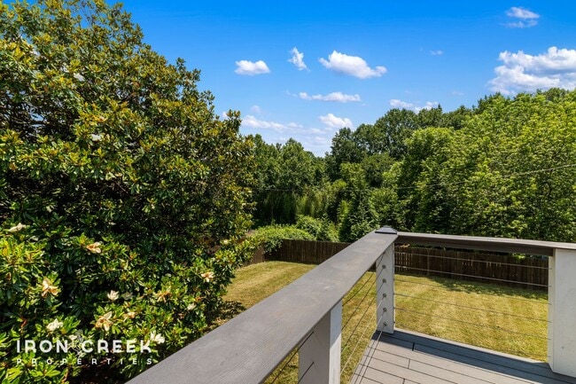 Building Photo - Beautifully Updated Three-Bedroom with Koi...