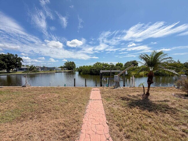 Building Photo - RENT THIS CANAL FRONT HOME WITH ZERO DEPOSIT DOWN