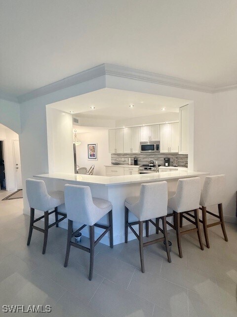 Building Photo - 7056 Pelican Bay Blvd