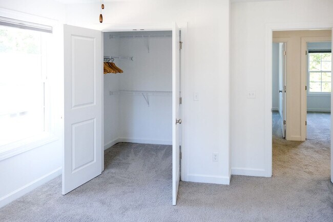 Building Photo - Like-new 3 bedroom, 2.5 bath house with an organic pond!