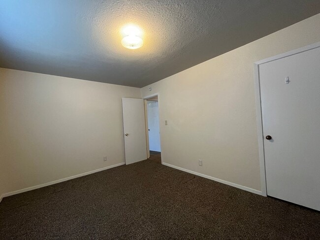 Building Photo - Sheridan Duplexes 01-03