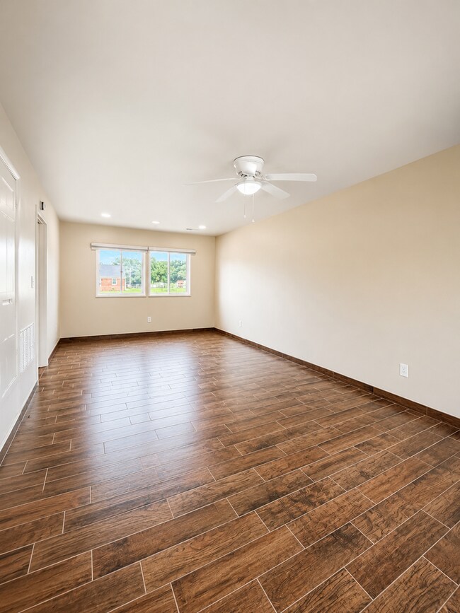 Building Photo - Completely Remodeled 4BR Home Steps from Alabama A&M University | Fenced Yard | Section 8 Welcome