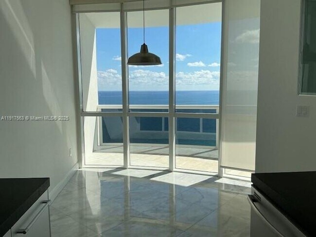 Building Photo - 18201 Collins Ave