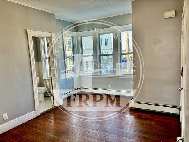 Building Photo - 121-129-129 Fulton St