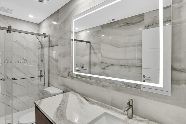 Building Photo - 8816 Collins Ave
