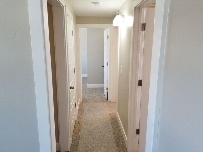 Building Photo - Spacious 5-Bedroom Magna Home with Deck and Ample Parking