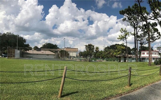 Building Photo - 6075 Village Cir