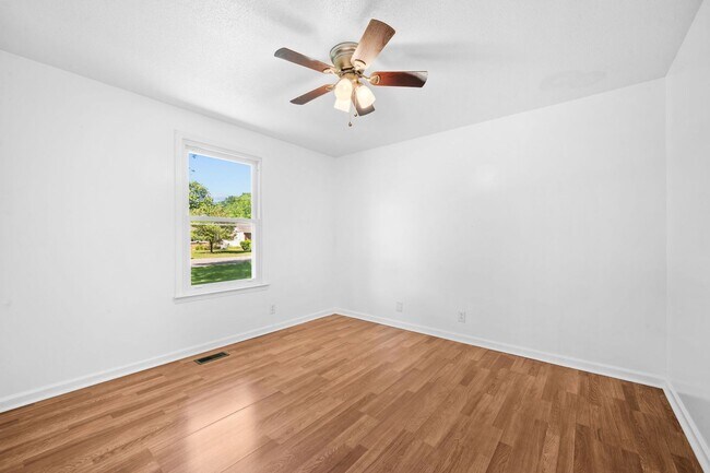 Building Photo - Spacious Yard + Fresh Interior Updates!