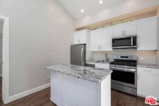 Building Photo - 7851 Airlane Ave