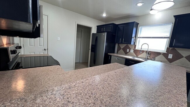 Building Photo - Newly Remodeled 4 Br 2 Bath off Stan Schlu...