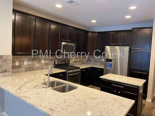 Building Photo - 9008 E Caley Way