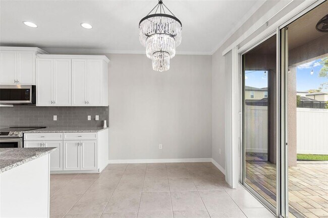 Building Photo - 7537 Pool Compass Loop