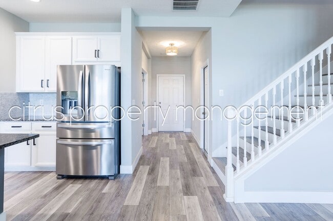 Building Photo - Stunning Double Waterfront 4/3 Home with Dock and Electric Boat Lift