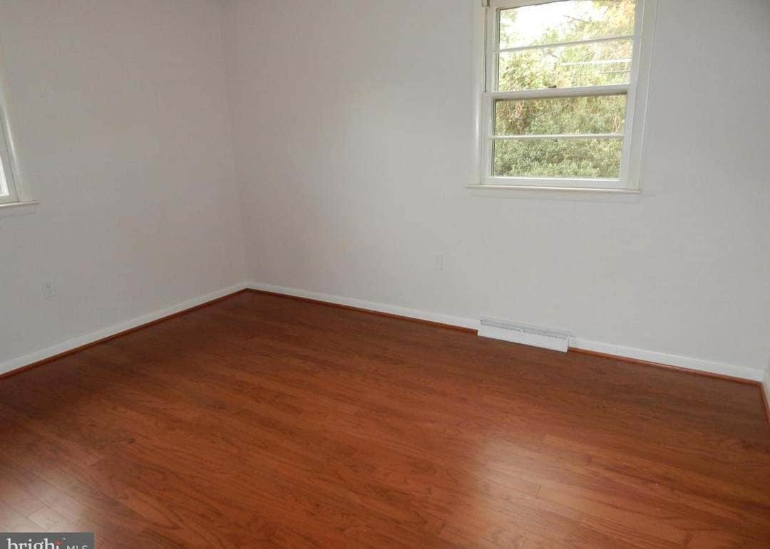 bright bedrooms with wood floors - 6916 Crafton Ln
