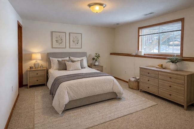 Building Photo - Spacious 3BR/3BA Condo with Finished Basement + 2-Car Garage — Available Now