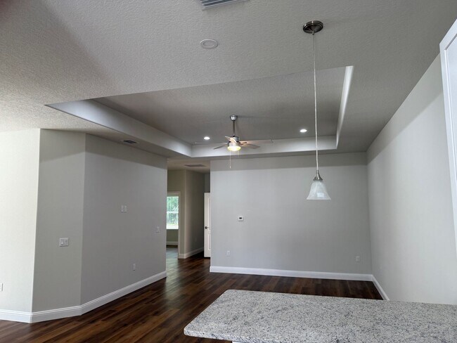 Building Photo - Brand New 3 Bedroom, 2 Bathroom Townhome with 1-Car Garage, Screened Porch & FULLY PRIVATE Fenced...