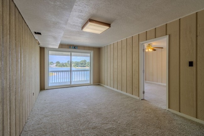 Building Photo - Price Improvement! Lakefront Dream Home – ...