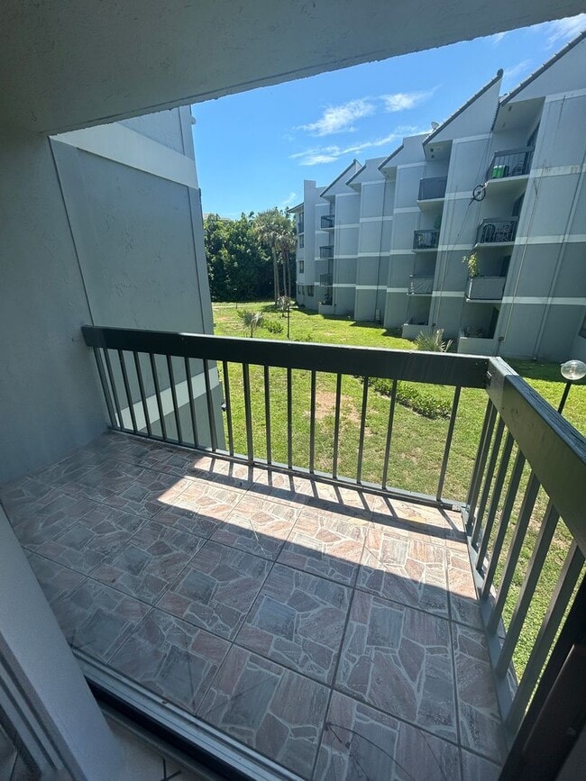 Building Photo - Now Leasing - Two bedroom condo with a pri...