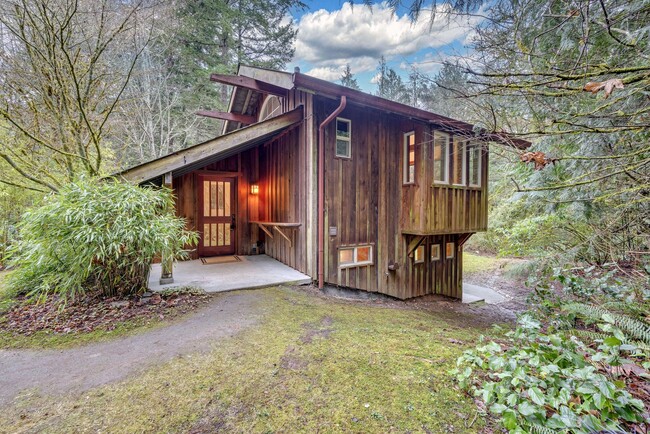 Building Photo - A unique home in the woods near Gazzam Lake