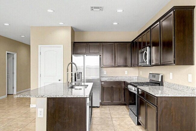 Building Photo - 8271 W Ebbets Ct