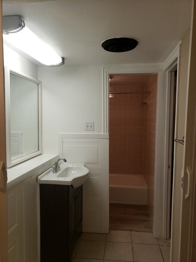 Vanity and bathroom from utility room - 500 E Avenue J