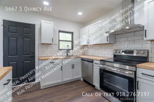 Building Photo - 5667 S Quincy Ave