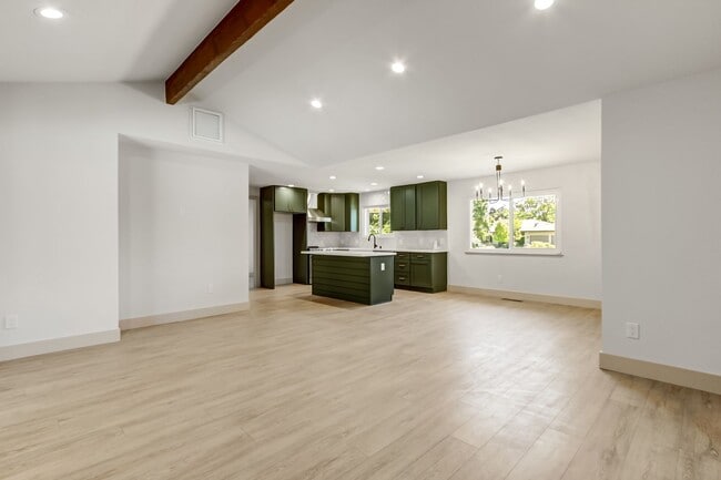 Building Photo - High-End 4-Bedroom Retreat | Designer Kitchen | Resort-Style Backyard & Pool!