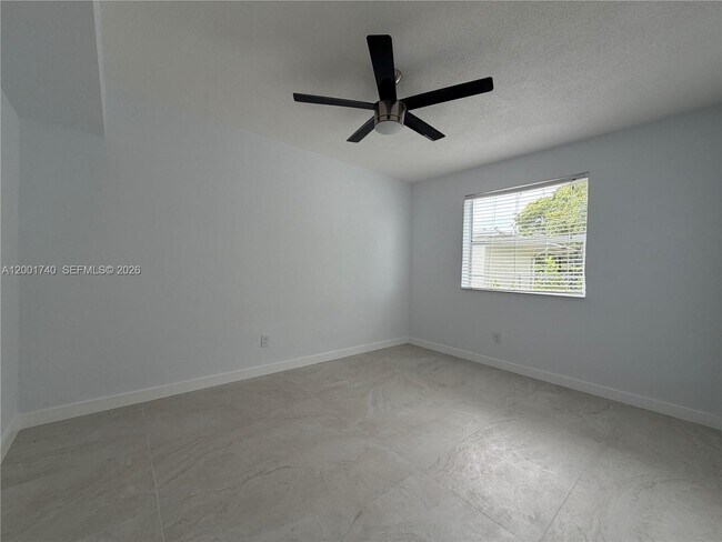 Building Photo - 5990 NE 4th Ct