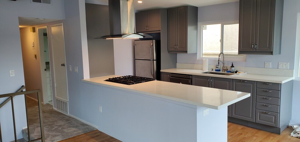 Kitchen wall and soffit were removed to provide a more open spacious kitchen - 419 Longfellow Ave