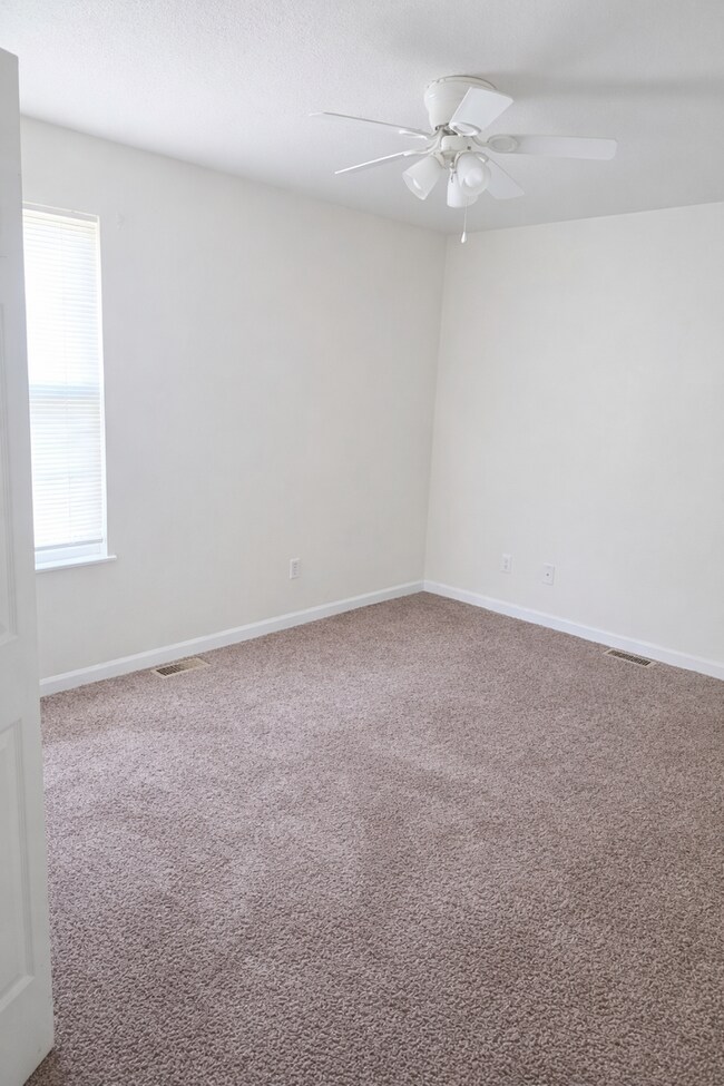 Building Photo - Spacious 2 Bed Downstairs Unit – W/D Hookups, Stove, Refrigerator, Water & Trash Included