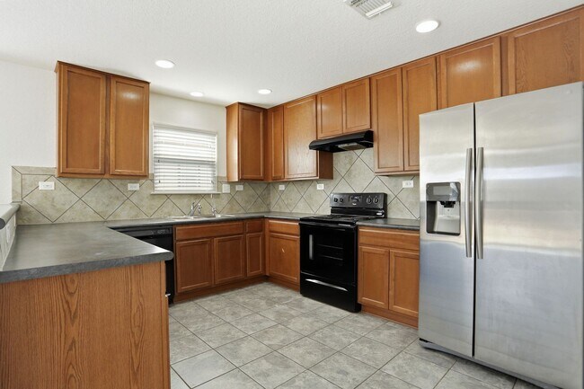 Building Photo - Spacious 4-Bedroom Home with Flexible Floor Plan in Growing West San Antonio