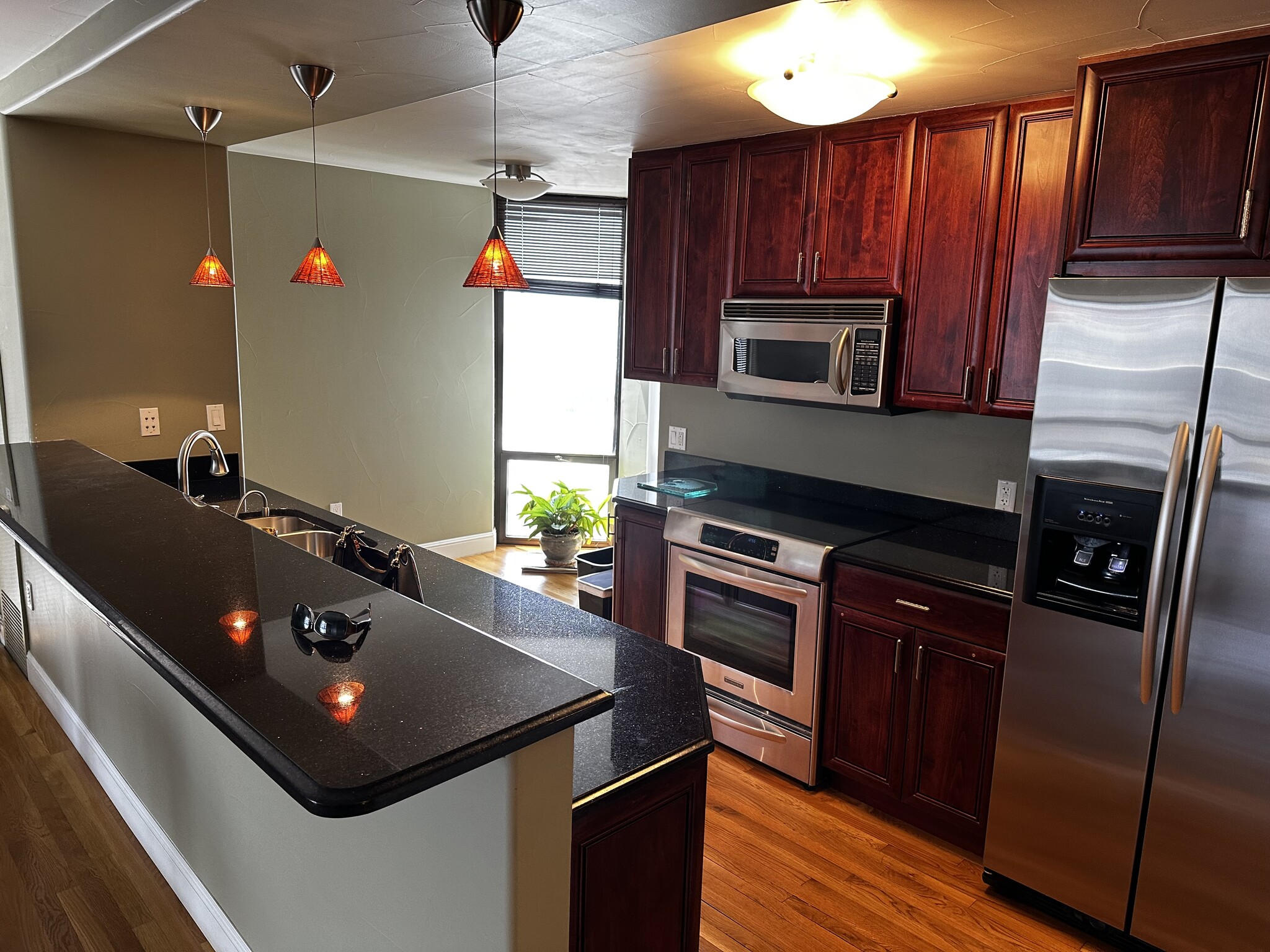 Kitchen Looking Towards Washer & Dryer Hookups - 1625 Larimer St
