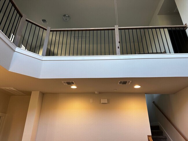 Building Photo - For Lease – Modern 2023 Condo Backing to Greenbelt | Creekside at Pioneer Crossing West