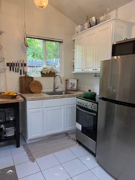 Stove and Refrigerator are less than 1 year old - 4337 Rhodes Ave