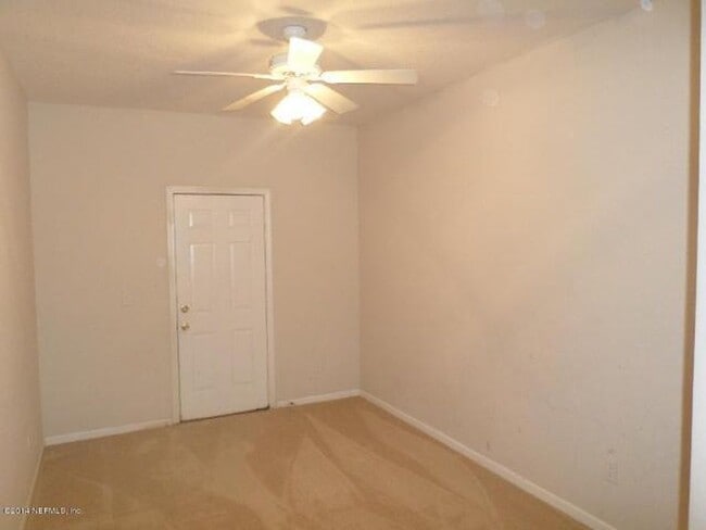 Building Photo - Welcome to this charming 2-bedroom, 2-bath...