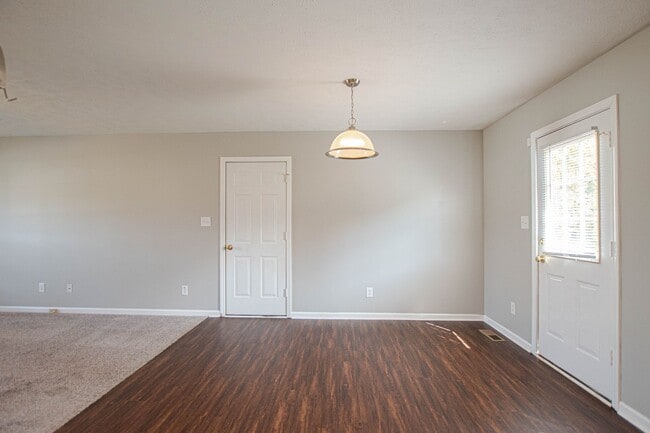 Building Photo - Pet Friendly with Fenced Yard!