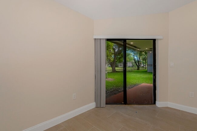 Building Photo - Fully Renovated Corner 1/1 “Villa” with Ba...
