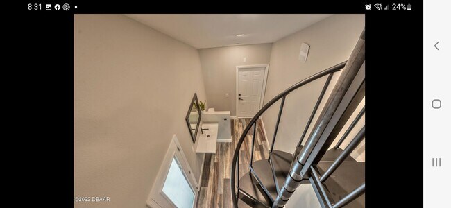 Spiral staircase to loft - 501 Silver Beach Ave