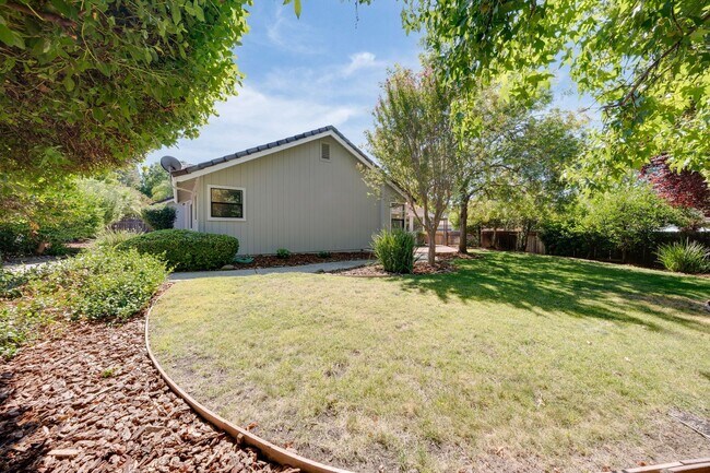 Building Photo - Bright and Stylish 4BD/2BA Home with 3 Car...