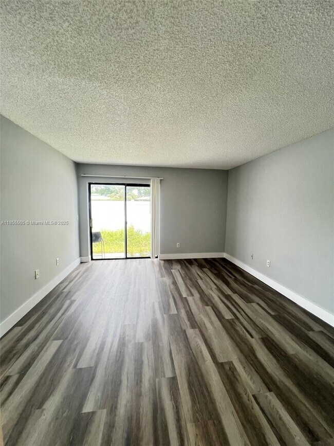 Building Photo - 10155 Boca Bend E