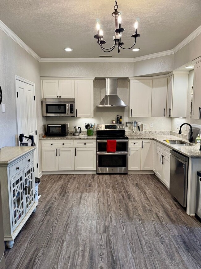Building Photo - WELCOME HOME to your Beautifully updated townhome.