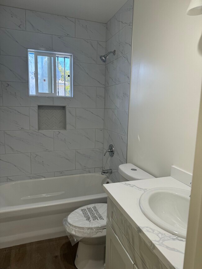 newly renovated bathroom - 901 W 82nd St