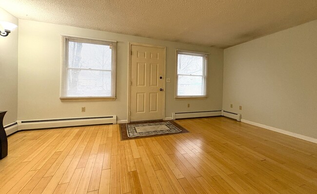 Building Photo - 10% off  1st month rent. Spacious 3 Bedroom, 2 Bath Townhouse with In-Unit Laundry in Lowell, MA