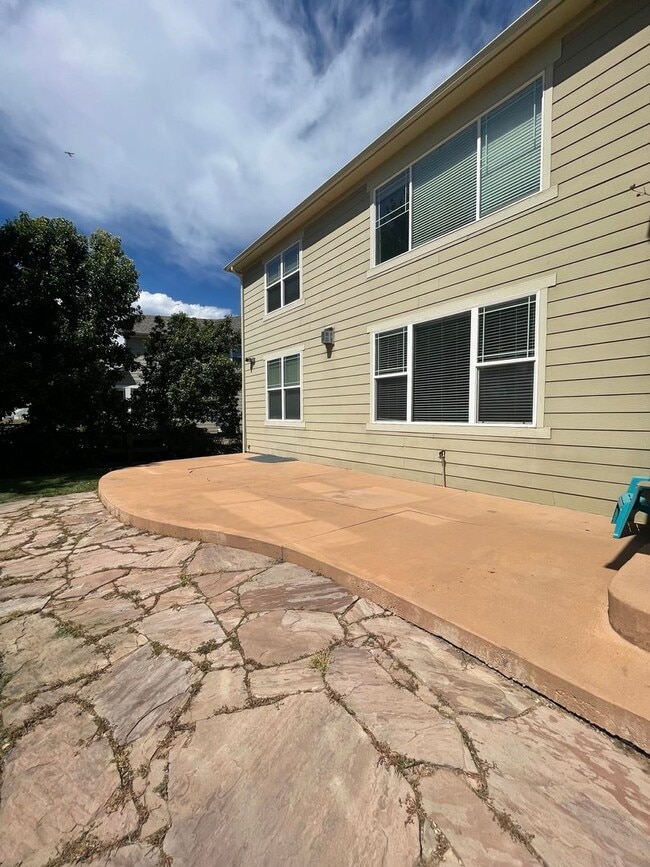 Building Photo - Sprawling Two-Story Home w/ Yard Maintenan...